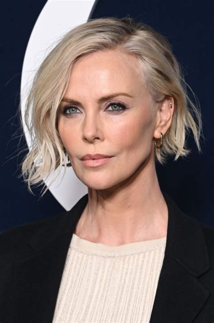 Charlize Theron in Bathing Suit Says "Don't Be Shy" — Celebwell