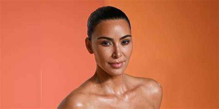 Kim Kardashian Puts On A Vibrant Display In Burberry Two Piece Bathing Suits