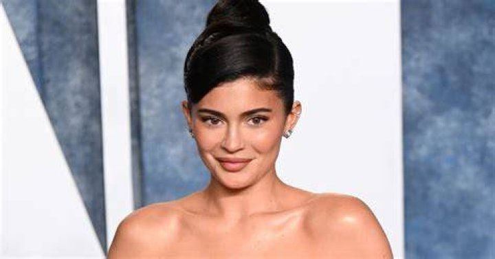 Kylie Jenner Turns Head In Stunning Red Dress In Photos With Travis Scott At Clive Davis’ Party
