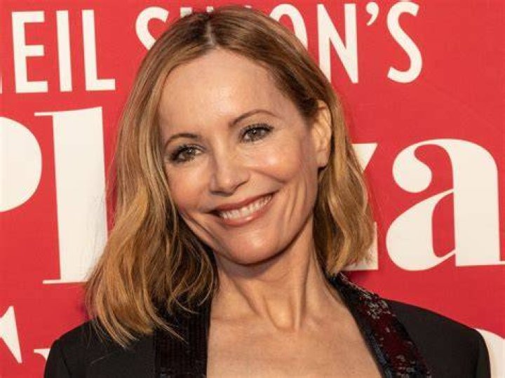 Leslie Mann Shows Off Flat Tummy and Toned Legs Rolling Around on The Beach — Celebwell