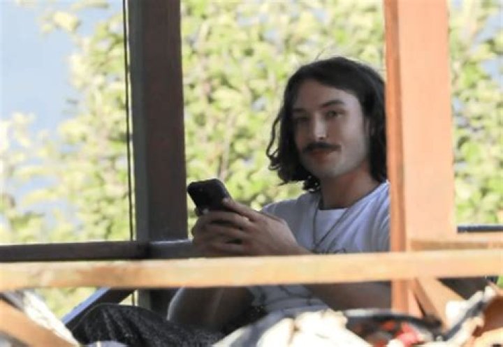 The Day Following His Third Arrest Of The Year, Ezra Miller Grinned Mischievously